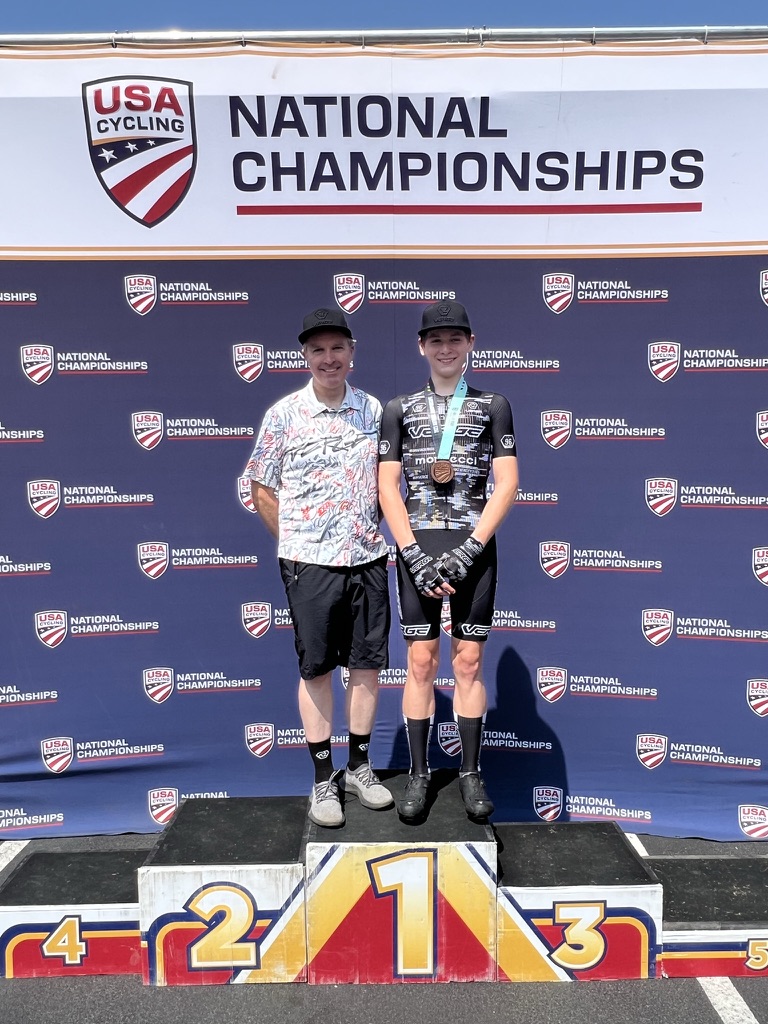 David Sommerville with a junior athlete at USA Cycling National Championships