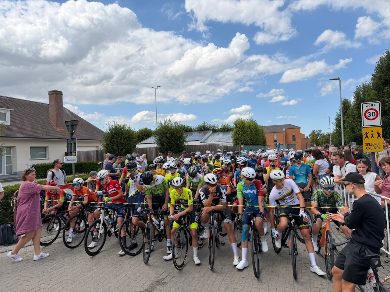 Junior riders assembled at the start of a Belgian race