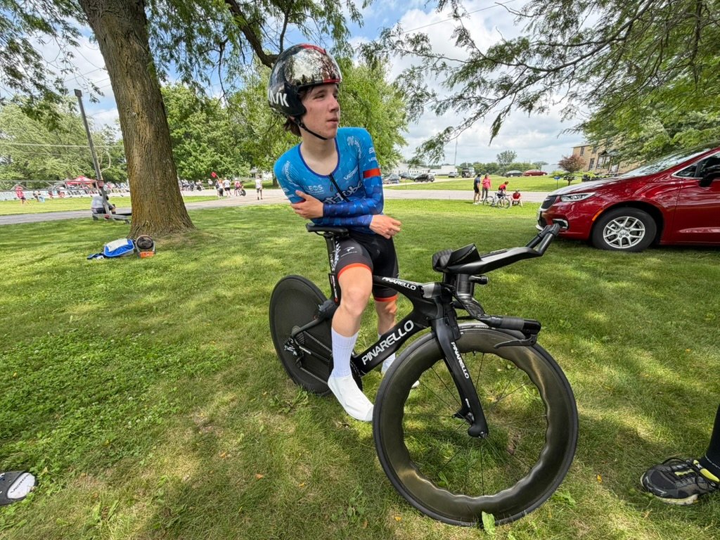 Cyclist with a time-trial bike before riding